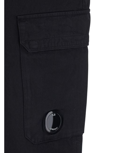 C P Company Blue Cargo Pants With Two Cargo Pockets On The Front And Logo Plaque On The Side for men