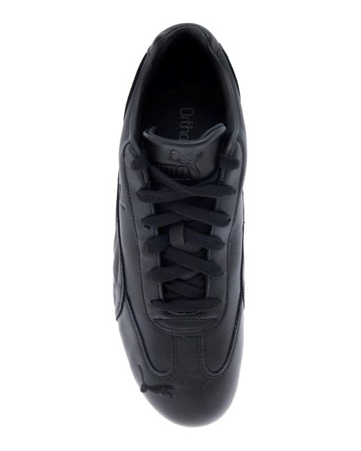 PUMA Black 'Speedcat' Low Top Sneakers With Embossed Logo On The Tongue And Contrasting Sole
