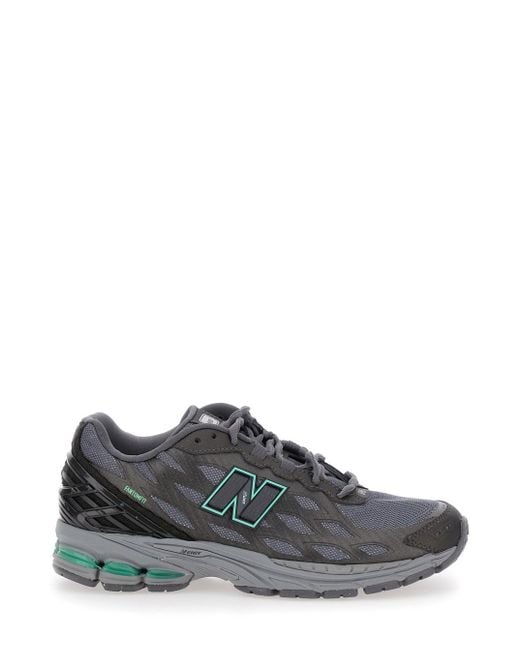 New Balance Gray Sneaker With Mesh Design And Logo