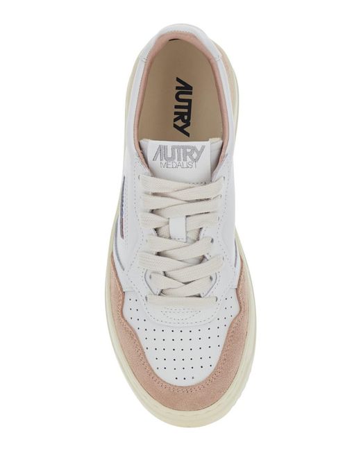 Autry White 'Medalist' Low Top Sneakers With Logo Patch On The Tongue