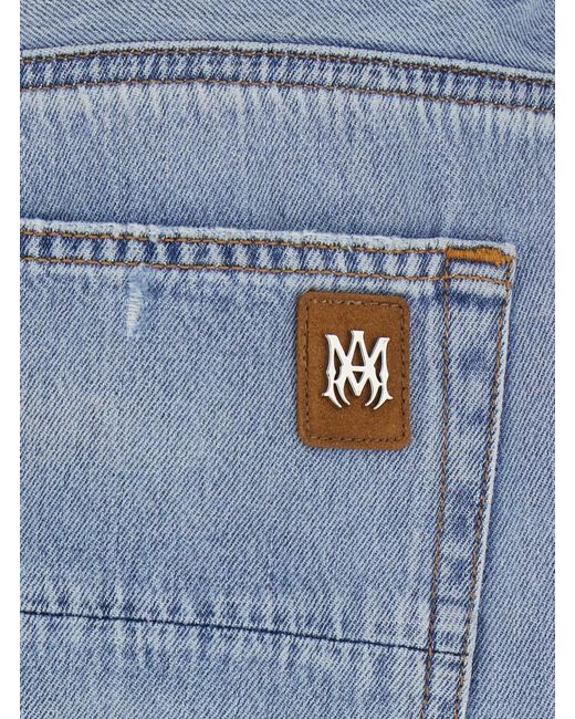 Amiri Blue Jeans With Ripped Details On The Front And Bow On The for men