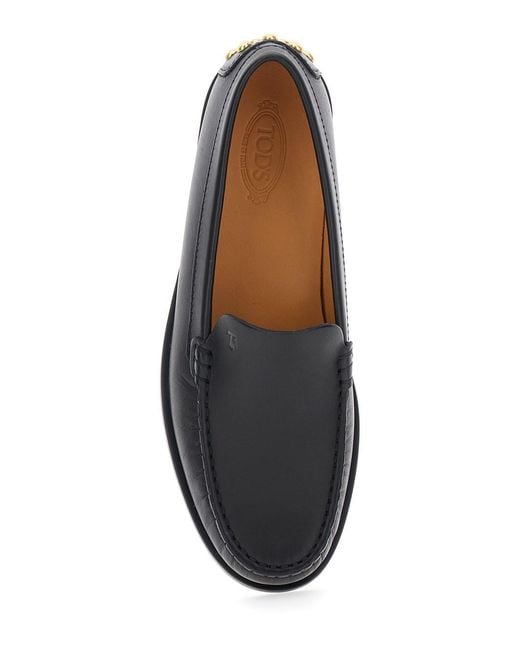 Tod's Black Loafers With Embossed Logo And Stud Details On The Back