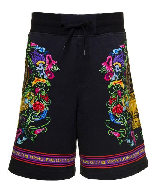 Pantaloncini con stampa floreale e logo lettering in cotone nero di Versace in Blue da Uomo