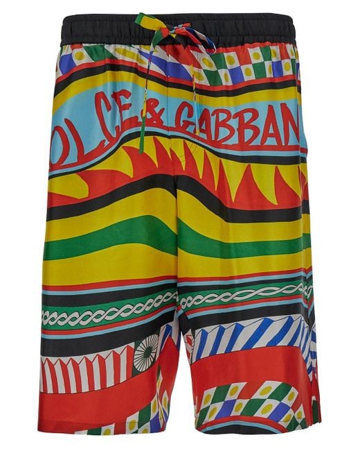 Pantaloncini con stampa carretto all-over in seta di Dolce & Gabbana in Multicolor da Uomo