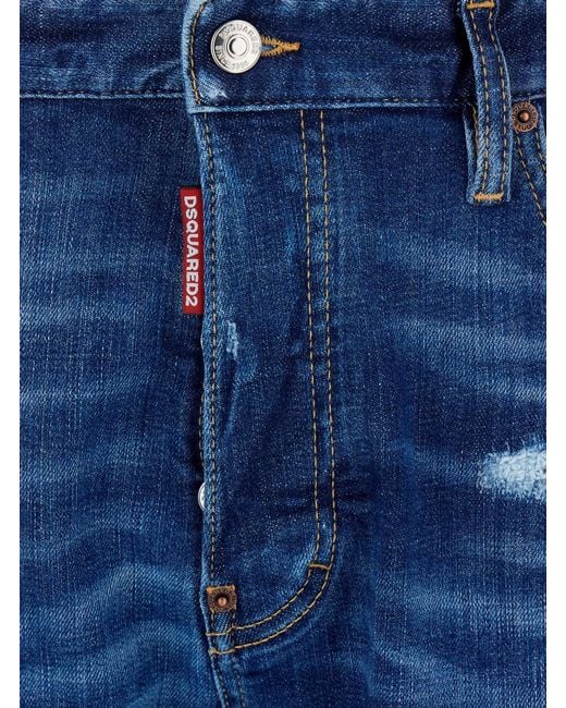 DSquared² Blue Jeans With Ripped Details And Logo Patch On The Back In for men