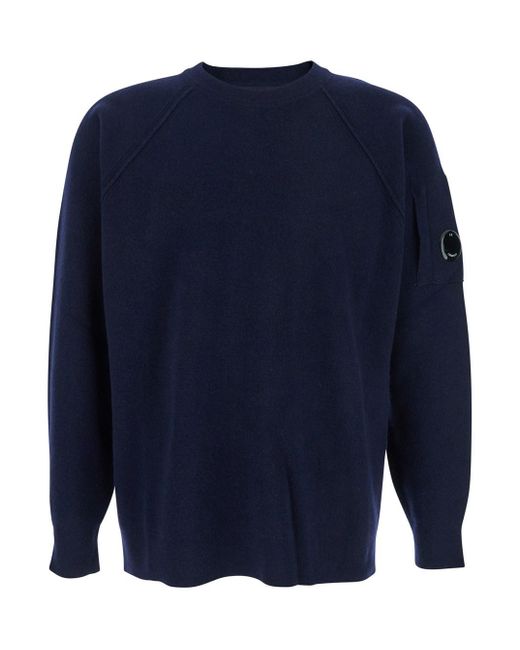 C P Company Blue Crew Neck Sweater With Compass Logo On Sleeve for men