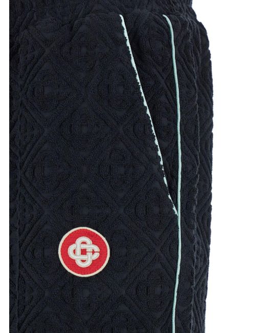 Casablanca Blue Pants With All-Over Embossed Monogram And Drawstring for men