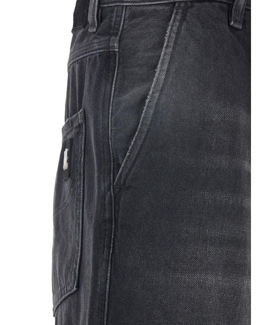 Amiri Blue Jeans With Logo Patch Applied On The Back for men