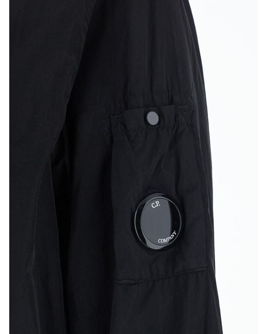C P Company Blue Jacket With Logo On The Front And Back And Logo Plate On The Sleeve for men
