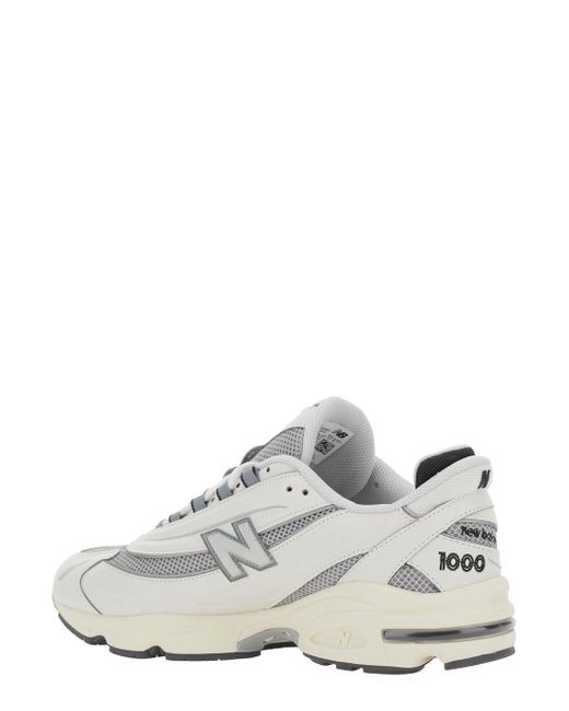 New Balance White Low Top Sneakers With Logo Patch On Side And Tongue And Perforated Panels