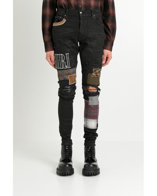 Amiri Black Grunge Patch Jeans for men
