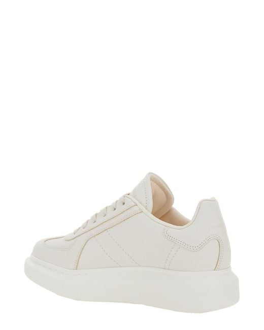 McQueen White Sneakers With Logo Patch On The Tongue And Embossed Logo On The Heel