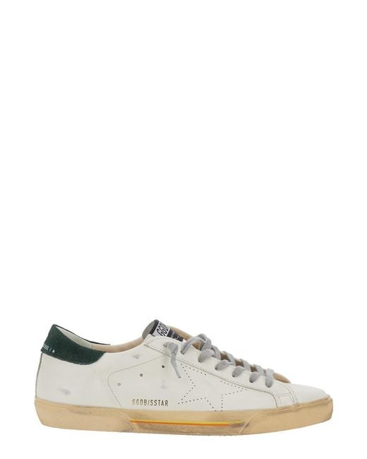 Golden Goose Deluxe Brand White 'Superstar' Low Top Sneakers With Contrasting Heel And Logo Patch On The Tongue for men