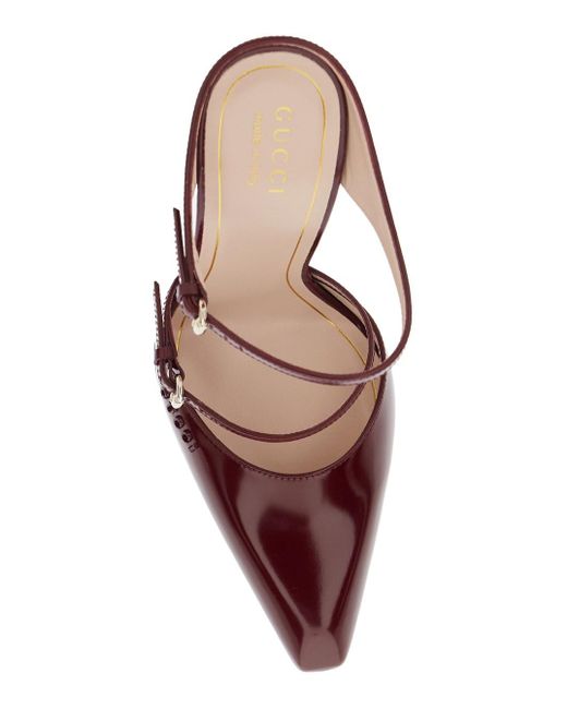 Gucci Pink Mules With Embossed Logo Lettering On The Front And Transpar