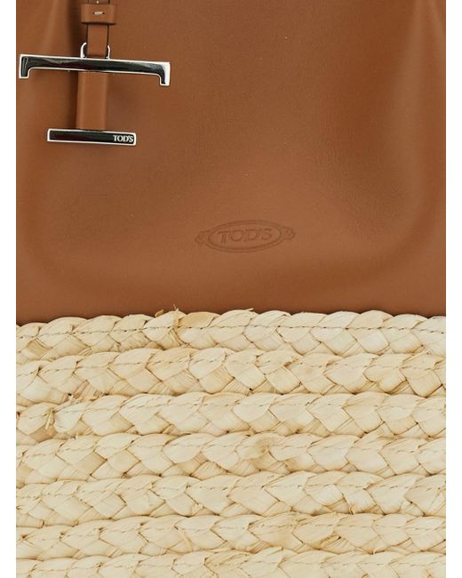 Tod's White 'Bux' Shopper With Logo Imprinted On The Front And Metal Logo Charm