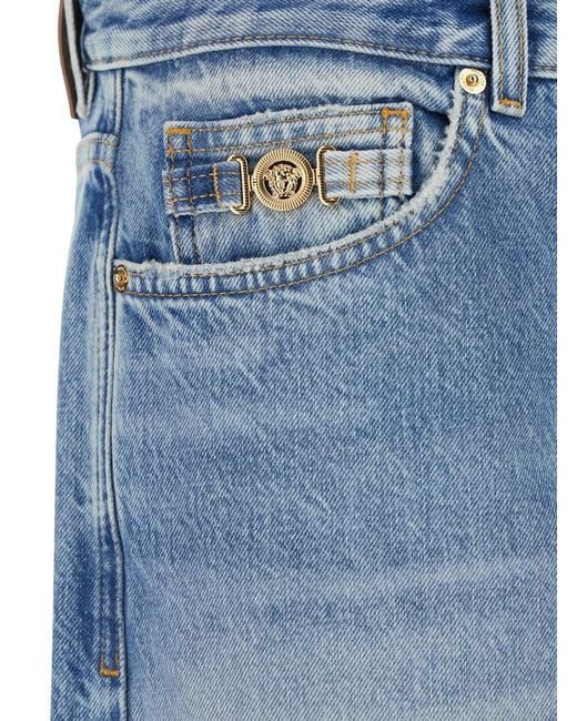 Versace Blue Jeans With Back Logo Patch And Faded Effect for men