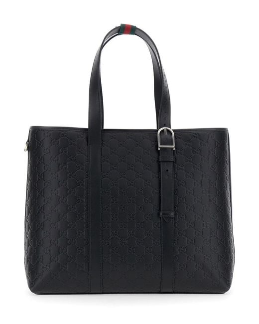 Gucci Black 'Emblem' Tote Bag With All-Over Embossed Gg Motif for men