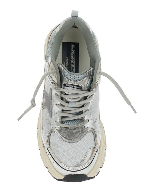 Golden Goose Deluxe Brand White Lightstar Low Top Sneakers With Star Patch On The Side And Logo Tongue