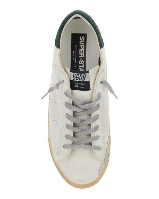 Golden Goose Deluxe Brand White 'Superstar' Low Top Sneakers With Contrasting Heel And Logo Patch On The Tongue for men
