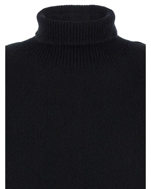 The Row Blue Oversized Cashmere Turtleneck Sweater