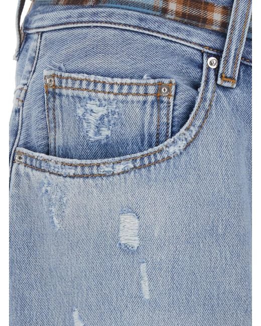 Amiri Blue Jeans With Ripped Details On The Front And Bow On The for men