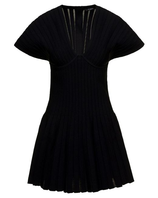 Short sleeves pleated knit short dress di Balmain in Black