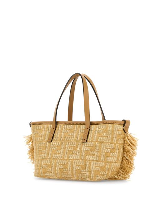 Borsa a mano Roll mini in rafia ricamata di Fendi in Metallic