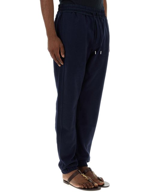 Pantalone jogging in cotone blu scuro di Saint Laurent in Blue da Uomo