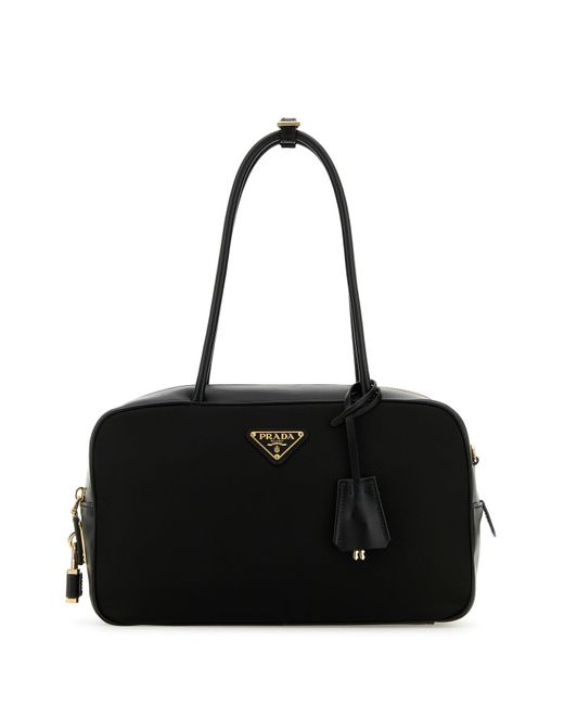 Borsa a mano in nylon nero di Prada in Black