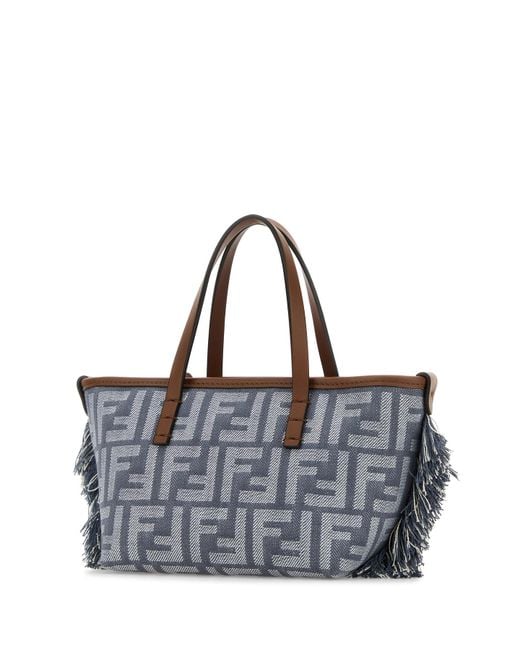Borsa a mano Roll mini in denim ricamato di Fendi in Gray