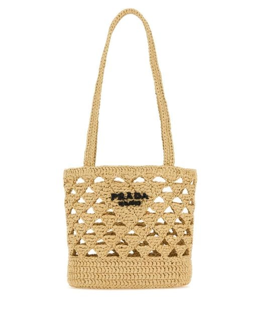 Borsa a mano in paglia di Prada in Metallic