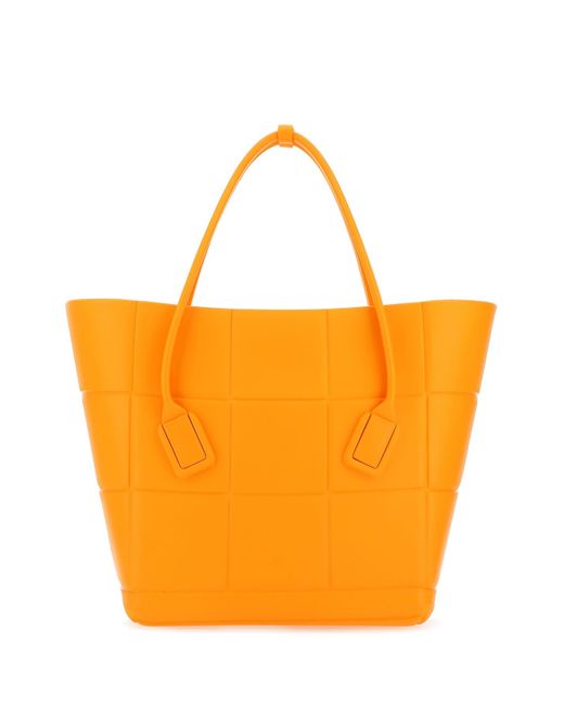 Bottega Veneta Orange Rubber Arco Shopping Bag - Save 3% | Lyst UK