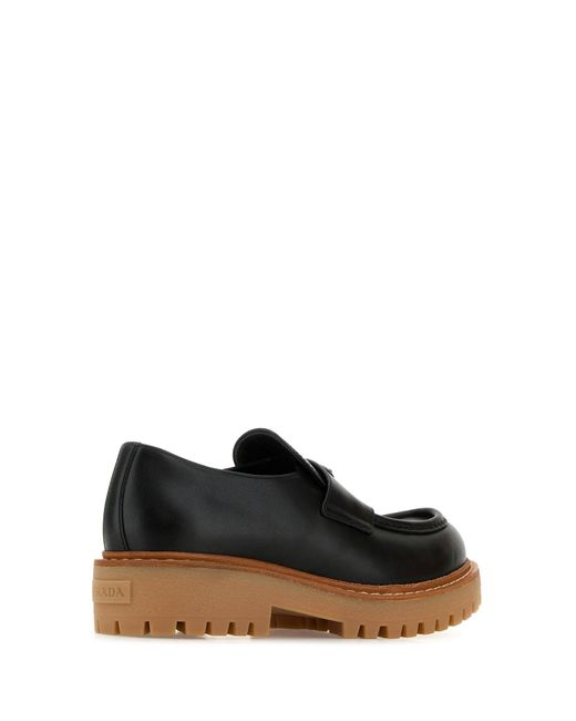 Mocassini in pelle nera di Prada in White da Uomo