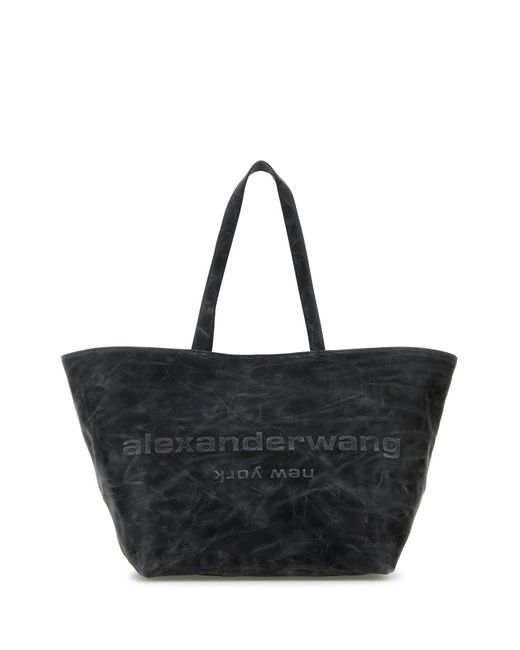 Borsa shopping Punch piccola in pelle grigio scuro di Alexander Wang in Black