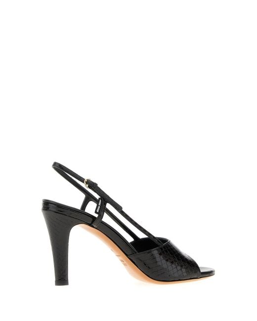 Sandali in pelle nera di Miu Miu in Black