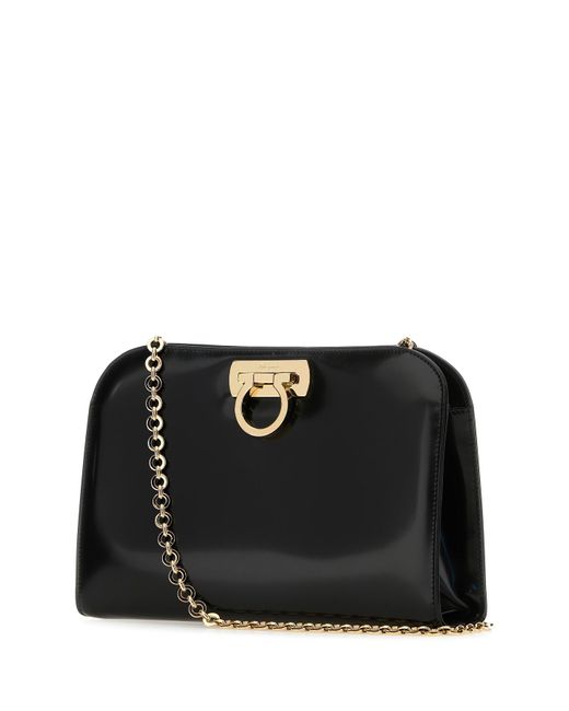 Clutch in pelle nera di Ferragamo in Black