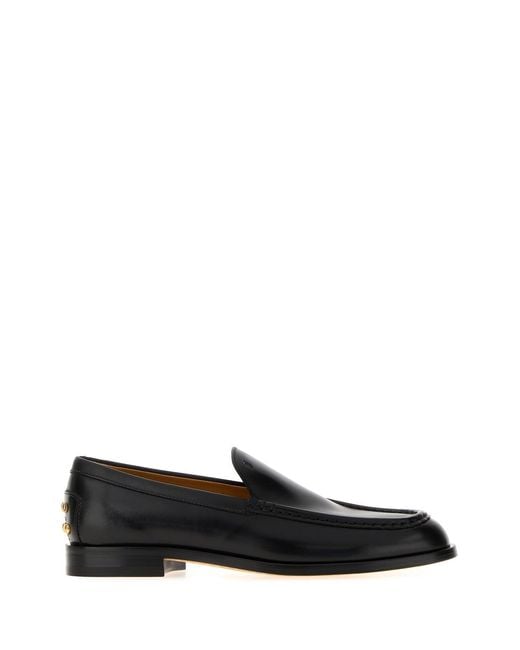 Tod's Black Leather Loafers