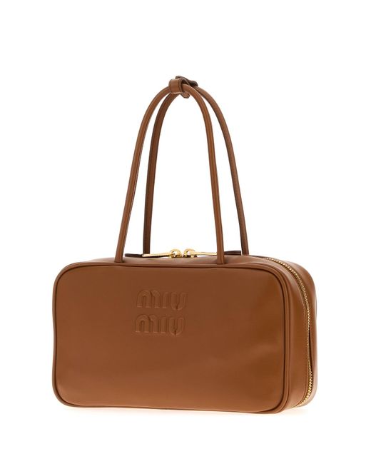 Borsa a spalla in pelle caramello di Miu Miu in Brown