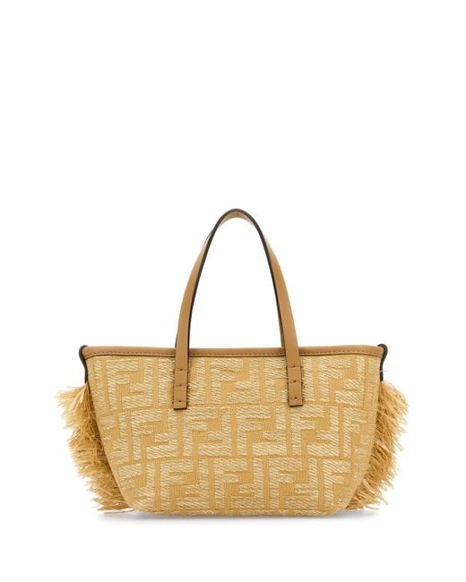 Borsa a mano Roll mini in rafia ricamata di Fendi in Metallic