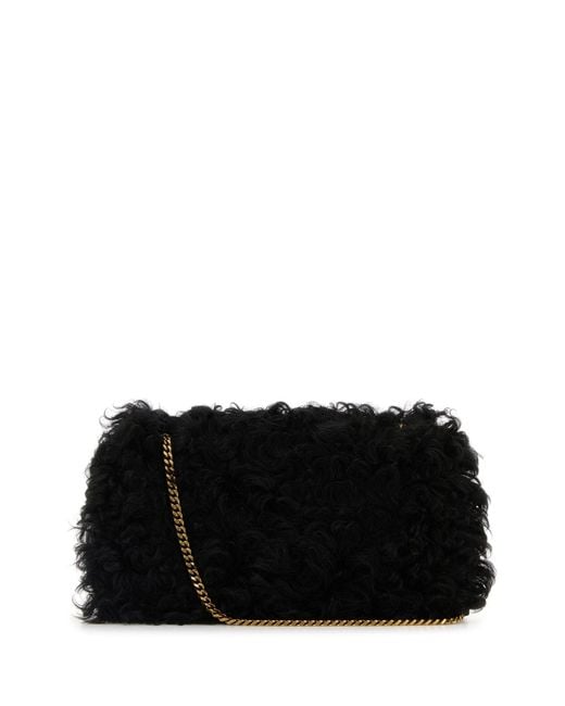 Borsa a spalla Jamie media in shearling nero di Saint Laurent in Black