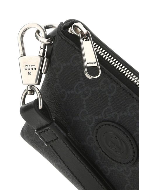 Clutch in tessuto GG Supreme nero di Gucci in Black da Uomo