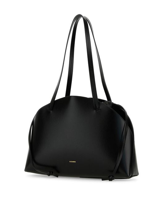 Borsa a spalla Curve media in pelle nera di Jil Sander in Black