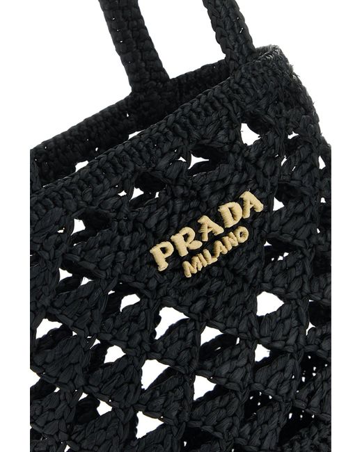 Borsa a mano in paglia nera di Prada in Black