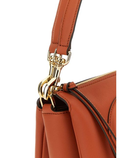 Borsa a spalla Mode Travia piccola in pelle mattone di MCM in Brown