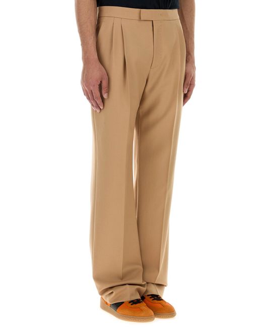 Pantalone dalla gamba ampia in lana cammello di Valentino Garavani in Natural da Uomo