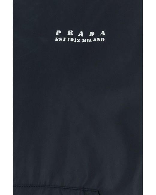 Giubbino imbottito in Re-Nylon blu navy di Prada in Blue