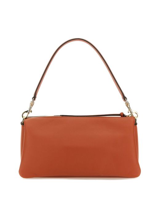 Borsa a spalla Mode Travia piccola in pelle mattone di MCM in Brown