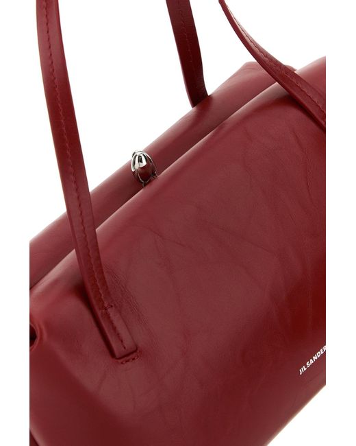 Borsa a mano Goji Pillow in pelle rosso tiziano di Jil Sander in Red