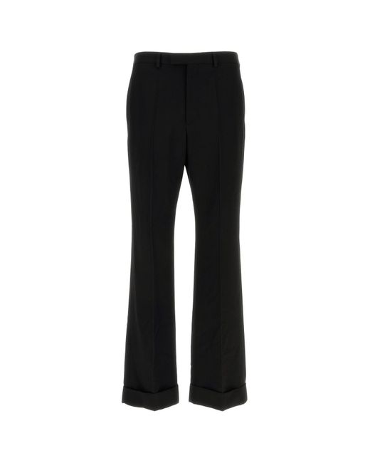 Pantalone in lana nera di Valentino Garavani in Black da Uomo