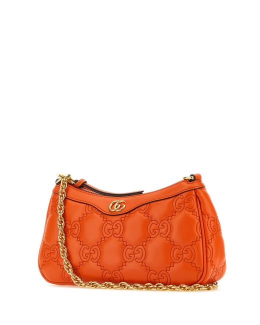 Gucci Orange Handbags.
